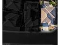 An aerial view showcases the home's roof. It is situated on a cul-de-sac street, perfect for a quiet neighborhood at 580 Via Di Parione Ct, Henderson, NV 89011
