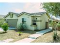 Charming single-story home featuring xeriscape landscaping and a welcoming walkway at 8223 Buffalo Ranch Ave, Las Vegas, NV 89147