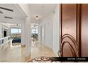 Elegant foyer featuring marble floors, chandelier lighting, and a glimpse of city views at 9101 Alta Dr # 706, Las Vegas, NV 89145