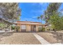Charming single-story home with a well-maintained front yard at 1553 Dorothy Ave # 4, Las Vegas, NV 89119