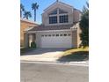 Charming two-story home with a two-car garage and well-maintained landscaping at 2416 Sun Shores Dr, Las Vegas, NV 89128