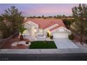 Charming single-story home featuring a desert landscaped yard and a neutral color palette at 2528 Sunup Dr, Las Vegas, NV 89134