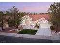 Beautiful daytime aerial view showcases a landscaped front yard and desert landscaping at 2528 Sunup Dr, Las Vegas, NV 89134