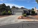 Attractive single-story home featuring a two-car garage and low maintenance desert landscaping at 7136 Overhill, Las Vegas, NV 89129