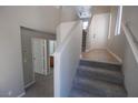Carpeted staircase leading to the upper level of the house at 6652 Weeping Pine St, Las Vegas, NV 89149