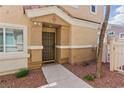 Charming townhome featuring a covered entryway with security door at 1069 Thrill Ct # 102, Henderson, NV 89002