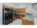Bright kitchen with stainless steel appliances and stylish countertops at 1069 Thrill Ct # 102, Henderson, NV 89002