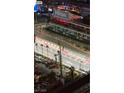 Night aerial view of F1 Grand Prix race course near Hilton Grand Vacations, Las Vegas at 135 E Harmon Ave # 2515, Las Vegas, NV 89109