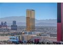 View of Las Vegas with the Trump Hotel, modern architecture, and mountain backdrop at 2877 Paradise Rd # 2502, Las Vegas, NV 89109
