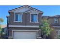 Two story home featuring a two car garage at 3339 Cromford Dr, North Las Vegas, NV 89081