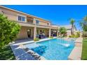 Inviting backyard pool and patio area perfect for outdoor entertaining and relaxation at 8303 Saddleback Ledge Ave, Las Vegas, NV 89147