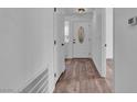 Hallway with view of front door and adjacent kitchen at 2851 S Valley View Blvd # 1098, Las Vegas, NV 89102