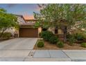 Charming home with a two-car garage, desert landscaping and a cozy front entrance at 1172 Via Della Costrella, Henderson, NV 89011
