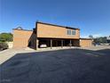 Exterior showing building and covered parking with multiple parking spaces for residents at 1474 Santa Anita Dr # B, Las Vegas, NV 89119