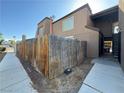 View of the exterior and walkway showing the building's neutral paint and design at 1474 Santa Anita Dr # B, Las Vegas, NV 89119