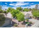 Well-maintained property with vibrant landscaping and an attached two-car garage, nestled in a friendly neighborhood at 2137 Point Mallard Dr, Henderson, NV 89012
