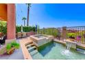 Backyard pool with a patio, a seating area, a grill and two palm trees in an outdoor setting at 2733 Auchmull St, Henderson, NV 89044