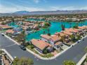 Beautiful aerial view of waterfront community with lush landscaping and serene blue waters at 3061 Waterside Cir, Las Vegas, NV 89117