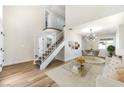 Bright living room boasts high ceilings and staircase leading to the second story loft at 416 Greenbrook St, Las Vegas, NV 89110