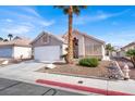 Single-story house with desert landscaping, offering low maintenance and water conservation at 5244 Velazco Ln, Las Vegas, NV 89130