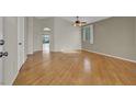 Bright living room featuring hardwood floors and neutral paint at 5244 Velazco Ln, Las Vegas, NV 89130