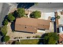 Aerial view of the house featuring roof details and surrounding landscaping at 5518 Avenida Vaquero, Las Vegas, NV 89108