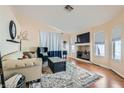 Comfortable living room with a large area rug, modern furnishings, and natural light at 7705 Granberg Ct, Las Vegas, NV 89131