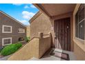 Inviting unit entrance with decorative security door, providing privacy and curb appeal in a multi-unit dwelling at 7950 W Flamingo Rd # 2019, Las Vegas, NV 89147