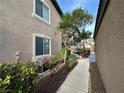 Walkway showing lush landscaping and convenient access to units at 8985 S Durango Dr # 1033, Las Vegas, NV 89113
