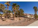 A view of the side and rear exterior elevation featuring a gravel landscape at 9524 Quail Ridge Dr, Las Vegas, NV 89134