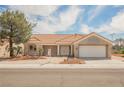 Attractive single-story home featuring low maintenance landscaping and a two-car garage at 3116 Richland Dr, Las Vegas, NV 89134