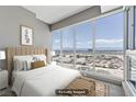 Cozy bedroom with ample natural light and stunning city vistas at 4575 Dean Martin Dr # 1208, Las Vegas, NV 89103