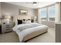 Comfortable bedroom showcasing neutral tones, soft natural light, and contemporary furnishings at 4665 Parkarbor Ave, Las Vegas, NV 89141
