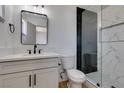 Stylish bathroom with a modern vanity, sleek fixtures, and a glass-enclosed shower at 1304 Virgil St, Las Vegas, NV 89110