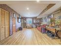 Spacious living room with hardwood floors, cozy seating, and decorative accents at 438 Las Casitas Way, Las Vegas, NV 89121
