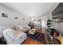 Bright living room featuring modern decor and updated kitchen at 59 E Agate Ave # 306, Las Vegas, NV 89123