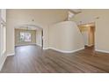 Bright and open living area with archways leading to adjacent rooms at 7808 Brook Valley Dr, Las Vegas, NV 89123