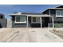 Inviting exterior of the home with a spacious driveway and well-kept yard at 904 Rockaway St, Las Vegas, NV 89145