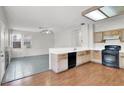 Functional kitchen featuring plenty of storage and laminate flooring at 1001 Padre Island St, Las Vegas, NV 89128