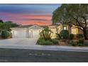 Attractive single-story home featuring desert landscaping, and a three-car garage at 1805 Prichard Ave, Henderson, NV 89052