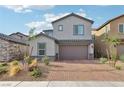 Charming two-story home with brick driveway and landscaped front yard, ideal for families at 4347 Outlook Vista Ave, North Las Vegas, NV 89084