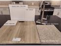 Interior design samples showcasing cabinet, quartz, paint, faucet and carpet styles and colors at 9997 River Corral St, Las Vegas, NV 89166