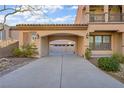 Spacious portico leads to a three-car garage, providing ample covered parking and additional storage space at 2805 Proust Ct, Henderson, NV 89044