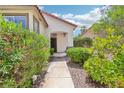 The walkway leads to the covered front entrance at 3029 Paseo Hills Way, Henderson, NV 89052