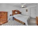 Airy main bedroom features carpet and ample space at 520 Stonehurst Dr, North Las Vegas, NV 89031