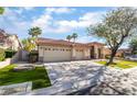 Beautiful home showcasing a manicured front lawn, mature trees, and a spacious three-car garage at 4176 Skywalker Ave, Las Vegas, NV 89120