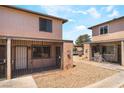 View of townhome exterior highlighting gated porch and proximity to other units at 3508 Rio Robles Dr # A, North Las Vegas, NV 89030