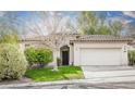 Charming single-story home with a tile roof, well-maintained lawn, and an attached two-car garage at 10505 Jeremy Ridge Ave, Las Vegas, NV 89144