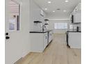 Bright kitchen with modern finishes, sleek countertops, and stainless steel appliances at 3124 Glenhurst Dr, Las Vegas, NV 89121