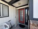 Close-up of the front door featuring a decorative security screen and storm door at 6117 Cromwell Cir, Las Vegas, NV 89107